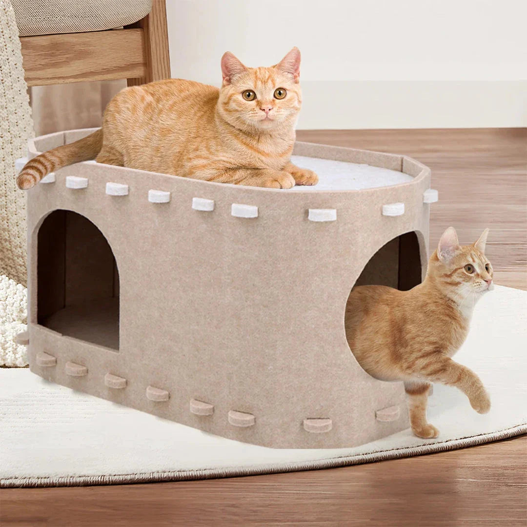 A cozy 2-in-1 cat bed featuring a hammock and a hiding house, designed for comfort and relaxation.