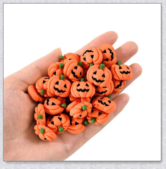 Minkin's resin flat-backed mini Halloween pumpkin miniatures in a variety of vibrant colors, perfect for DIY crafts and decorations