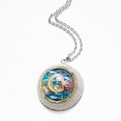 Handmade crystal pendant necklace with a sweater chain in a celestial-inspired design