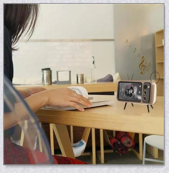 Retro TV Phone Holder & Bluetooth Speaker in multiple color options, providing hands-free viewing and wireless audio playback