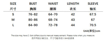 A white hooded top with a low-cut v-neck and long sleeves, designed to provide a flattering, slimming silhouette.