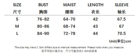 A white hooded top with a low-cut v-neck and long sleeves, designed to provide a flattering, slimming silhouette.