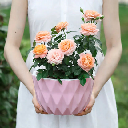 Sleek and modern wall hanging flower planter made of durable polyresin for indoor and outdoor use