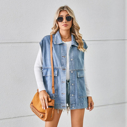 Denim vest with large pockets, sleeveless design, and fashionable silhouette for women's casual and everyday wear