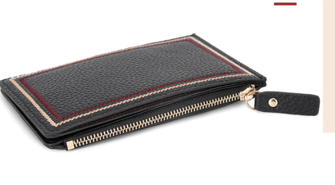 Premium leather wallet with compact, ultra-thin design and magnetic buckle closure for secure and convenient storage of cards, cash, and other essentials.