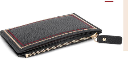 Premium leather wallet with compact, ultra-thin design and magnetic buckle closure for secure and convenient storage of cards, cash, and other essentials.