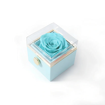 Acrylic rotating rose jewelry box in sapphire blue, 10cm diameter with three-layer storage and carrying bag