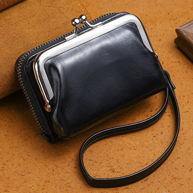 Ladies buckle-fastening coin purse with a 4-inch metal clip and zip, shown in multiple colour options.