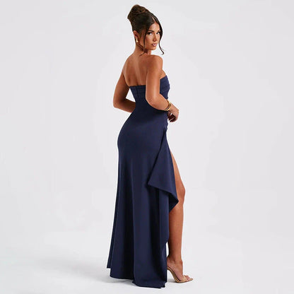 Backless pleated maxi dress in various colors, featuring high-waisted silhouette and unique design