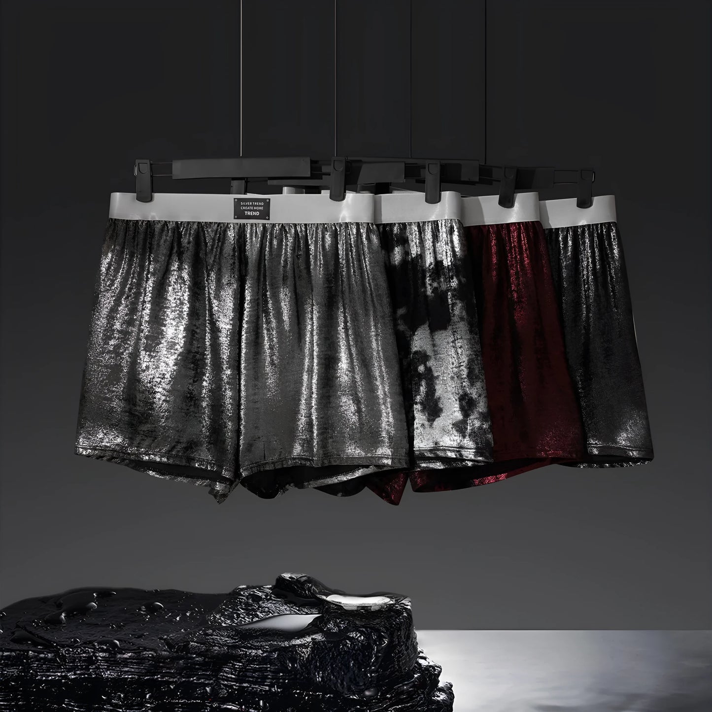 Men's reflective bright silver casual woven underwear with a loose fit and mid-waist.