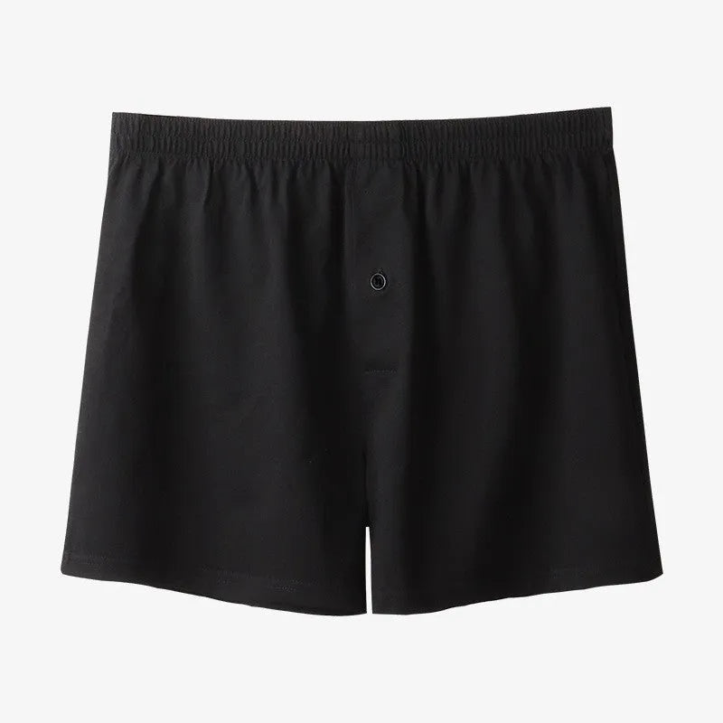 Men's cotton boxer shorts in black colour showing loose fit and high waist design