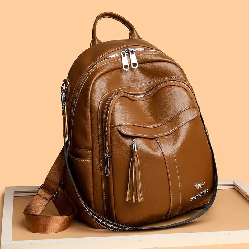 Genuine leather tassel backpack in khaki, black or brown with anti-theft pockets for casual travel