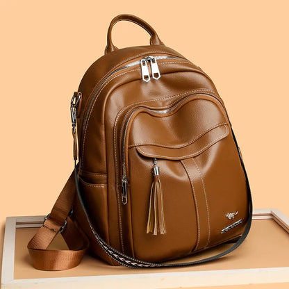 Genuine leather tassel backpack in khaki, black or brown with anti-theft pockets for casual travel