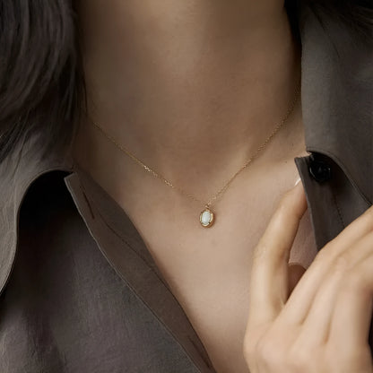 Oval jelly opal pendant necklace in 925 silver with gold or white gold plating
