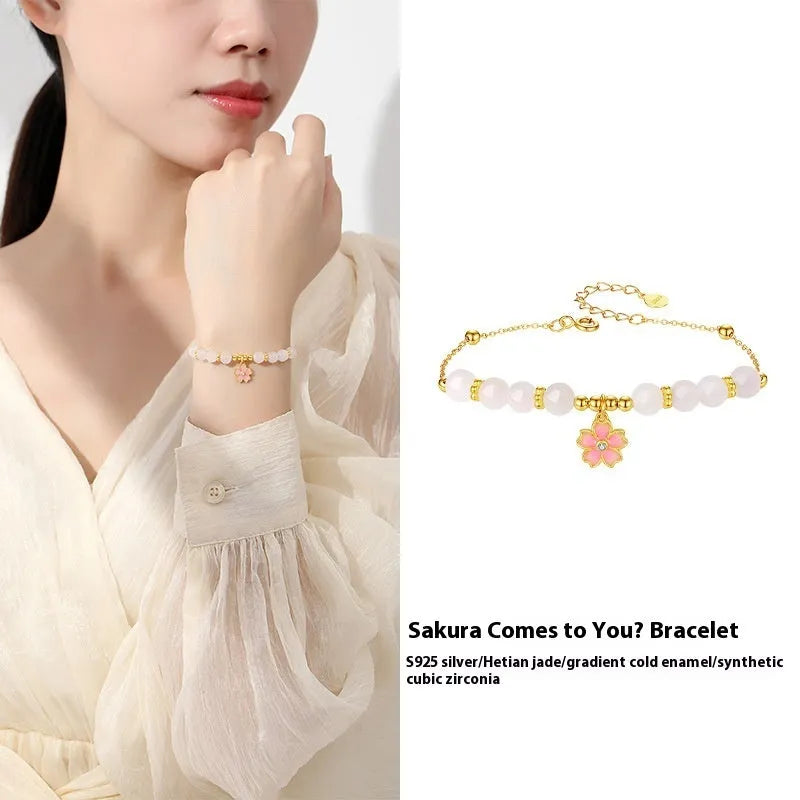 Pink silver bracelet with cherry blossom pendant and Hetian jade beads
