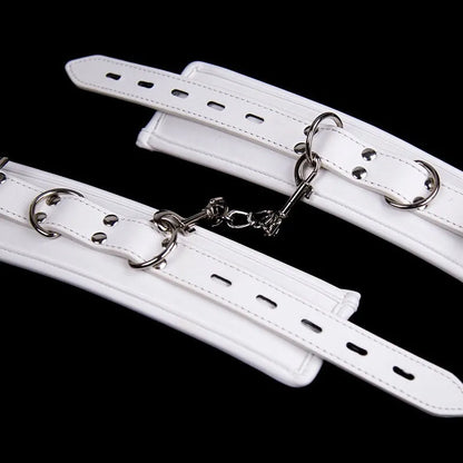 White PU sponge bondage set showing handcuffs, footcuffs and neck cuff for comfortable restraint