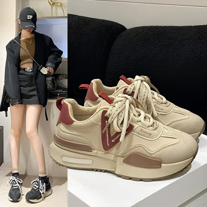 Women's black retro platform sports shoes with round toe and front lace-up fastening.