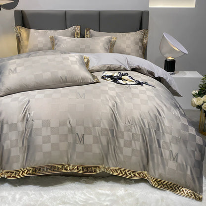 Cotton jacquard bed set with embroidery detailing and deep pocket fitted sheets in Advanced Grey colour