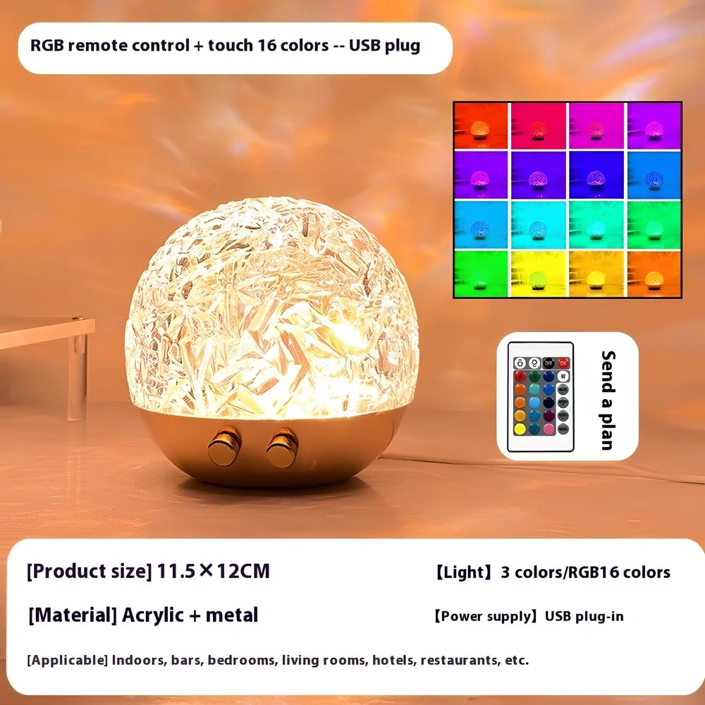 Spherical water ripple projector night light with touch controls creating colourful aurora patterns on wall
