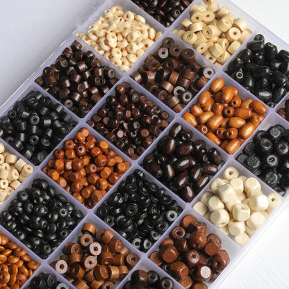 Mixed vintage solid wood beads scattered for DIY jewellery making and craft projects