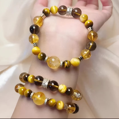 Close-up of a natural yellow 10mm artificial crystal bead bracelet for unisex wear.