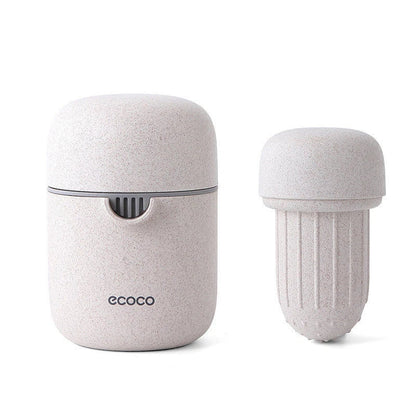 Versatile manual citrus juicer for extracting nutritious juices from oranges, lemons, grapefruits, and more using a compact and durable design