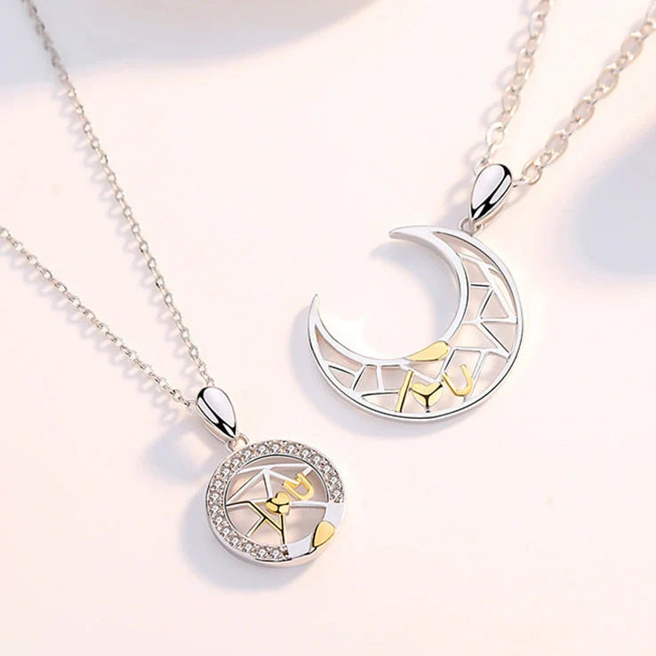 Sun Moon Tooth Couple Necklace showing electroplated copper pendants on 45cm cross chain