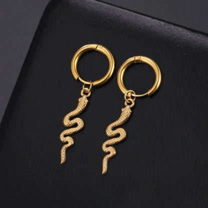 Gold coloured snake-shaped vintage clip-on earrings made from stainless steel.