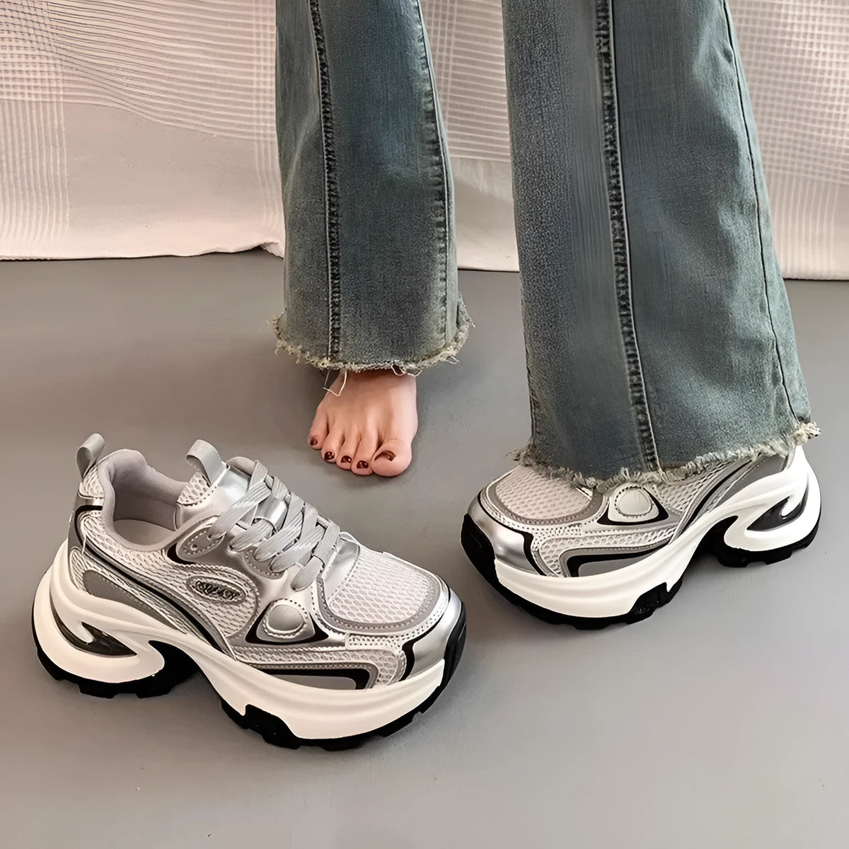 Women's silver and red mesh breathable platform sneakers with a round toe and lace-up front.