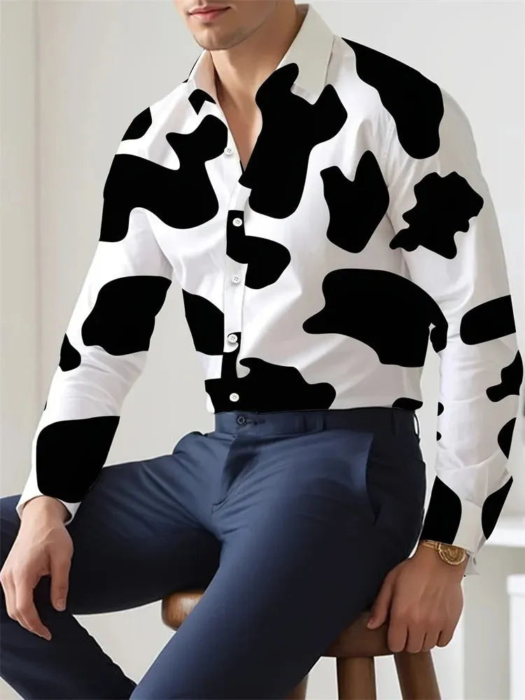 Man wearing a loose-fit, long sleeve Hawaiian shirt with a floral pattern