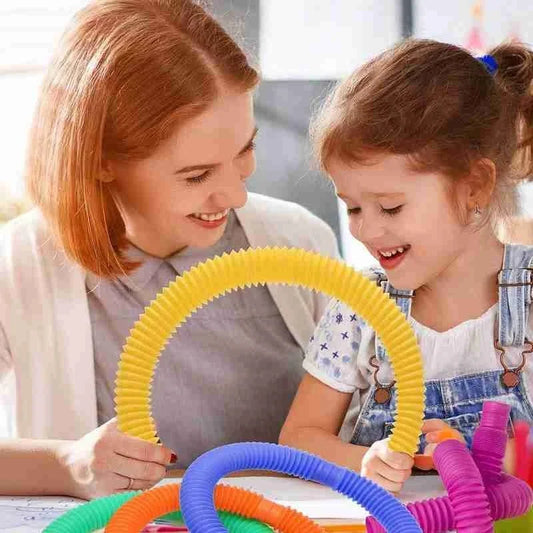 Colorful, flexible sensory fidget tube toy for kids, featuring vibrant colors and customizable shapes to promote creativity and sensory development