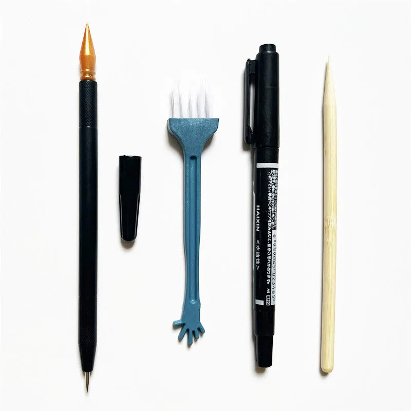Scratch art repair kit with scraper pen, repair solution, brush, small scraper, and bamboo stick components