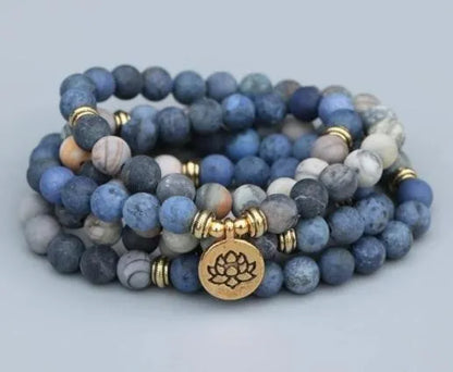 Handcrafted natural stone bracelet with alloy volcano white turquoise charm in a simple design.