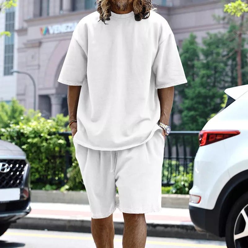Men's loose sports set with round neck T-shirt and drawstring shorts in various colors