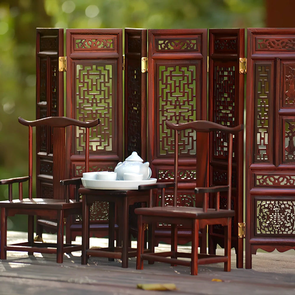 Red rosewood miniature Chinese furniture model with traditional carved details and mahogany construction