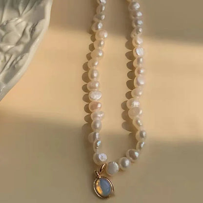 Adjustable French Court vintage pearl necklace with geometric design on alloy chain, showing length variation