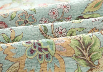 Blue American floral pattern cotton bedspread measuring 230x250cm with reactive printed bird and flower design