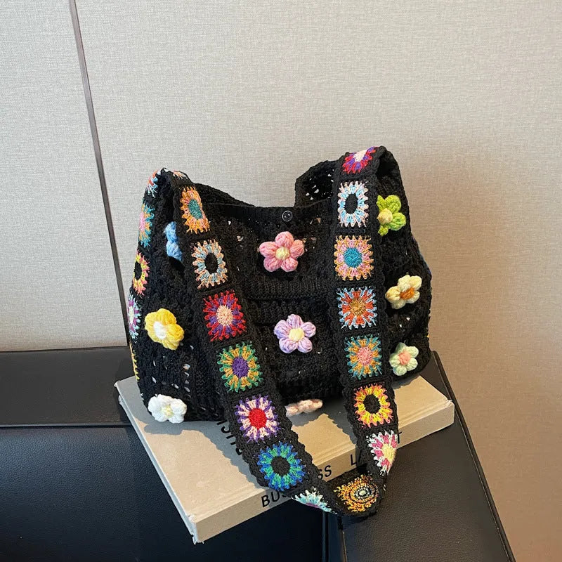 Woven polyester shoulder bag showing hollow knitting texture and single 41cm strap in neutral colour