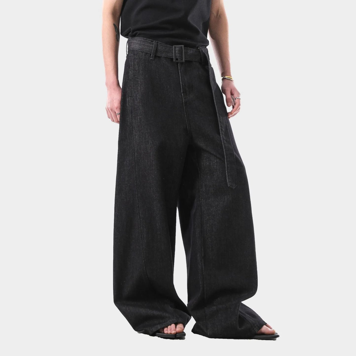Black high-waist straight-leg jeans with zip placket fly, made from cotton denim fabric