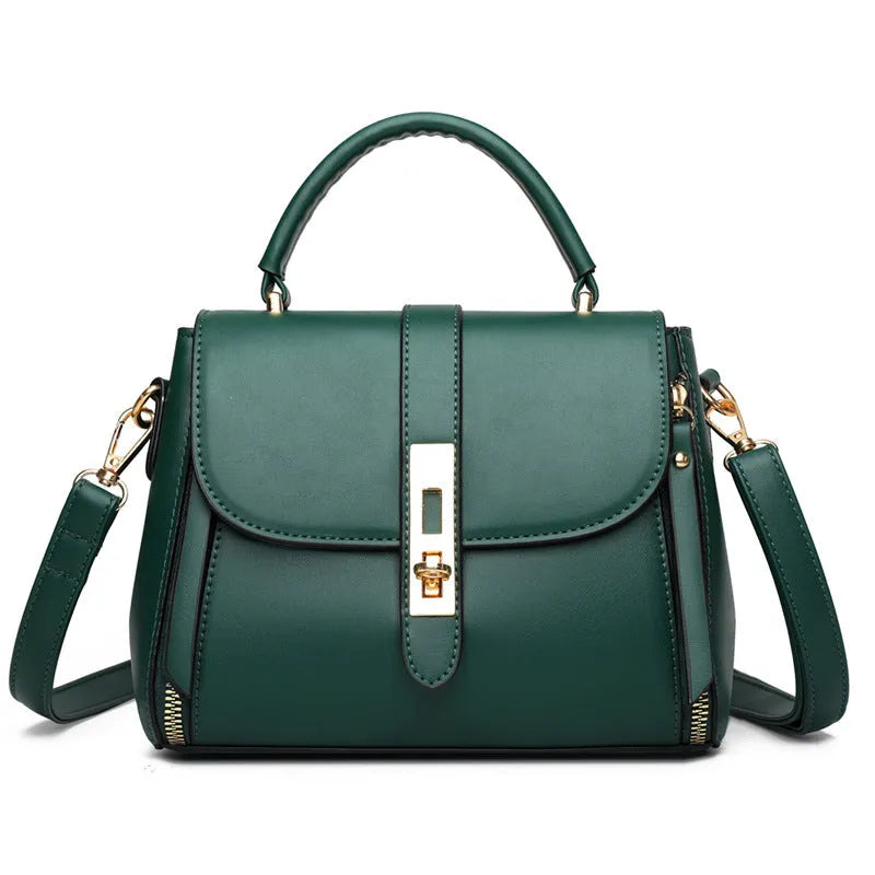 Women's soft black PU leather vertical messenger bag with adjustable strap, showing interior polyester lining.