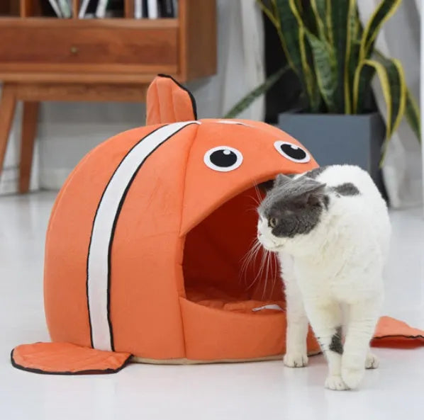 Orange cloth pet kennel with removable washable cover, available in sizes XS to L for cats and dogs