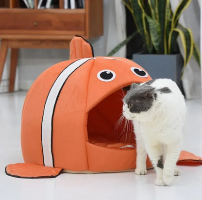 Orange cloth pet kennel with removable washable cover, available in sizes XS to L for cats and dogs