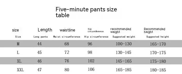 Men's black quick-dry training shorts with elastic waistband, shown knee-length.