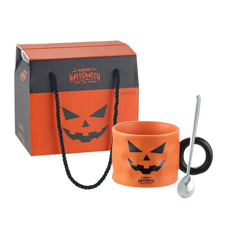 Ceramic pumpkin-shaped mugs in orange and white colors, featuring a sturdy handle and festive holiday design
