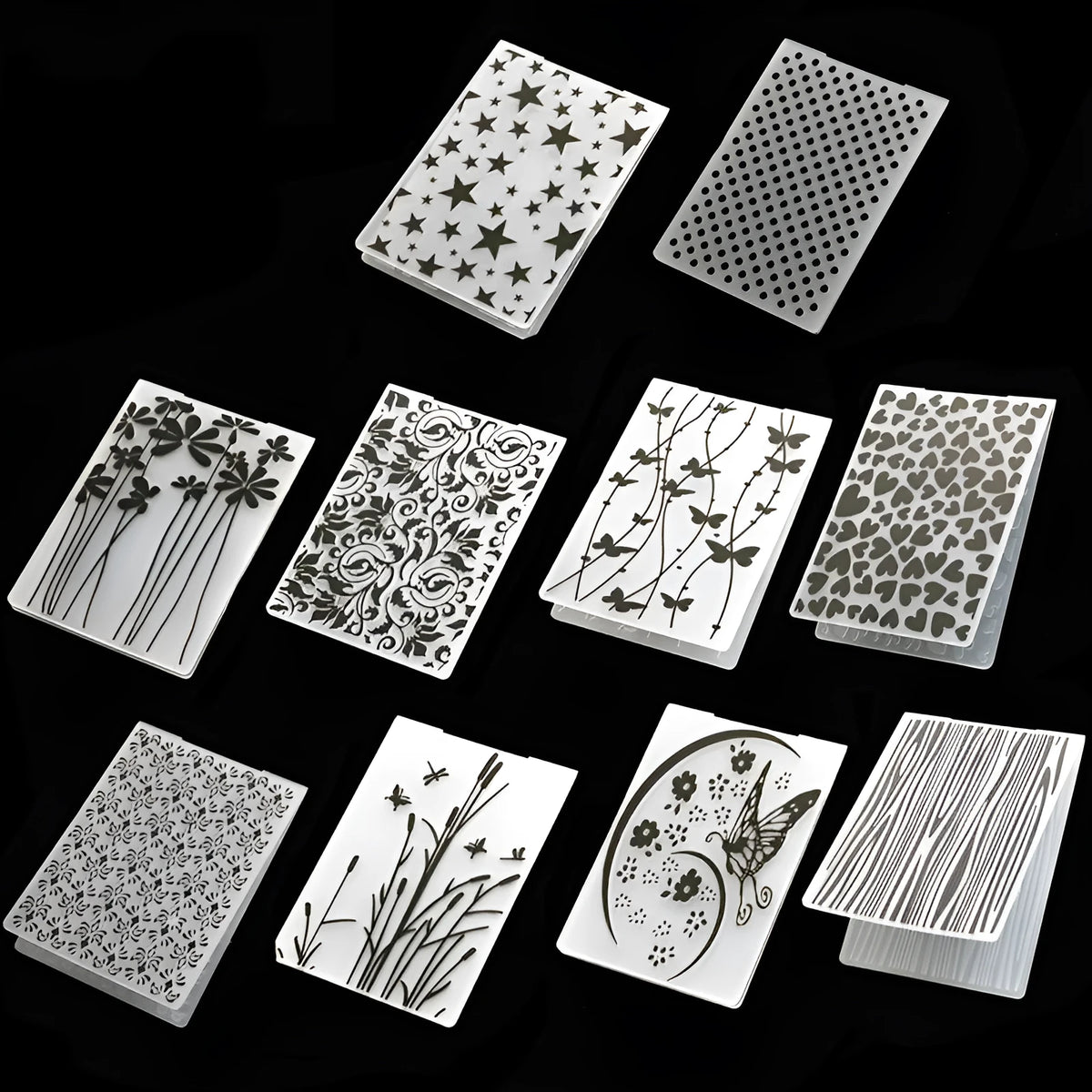 Set of ten plastic cake decorative moulds showing windmill, star, flower, and butterfly patterns.