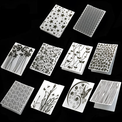 Set of ten plastic cake decorative moulds showing windmill, star, flower, and butterfly patterns.