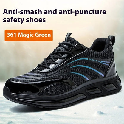 Lightweight orange and grey safety shoes with leather upper and rubber sole on a work floor.