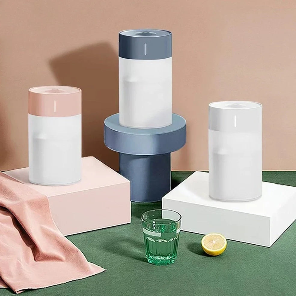 Columnar ultrasonic humidifier in pearl white measuring 140mm × 70mm with USB cable