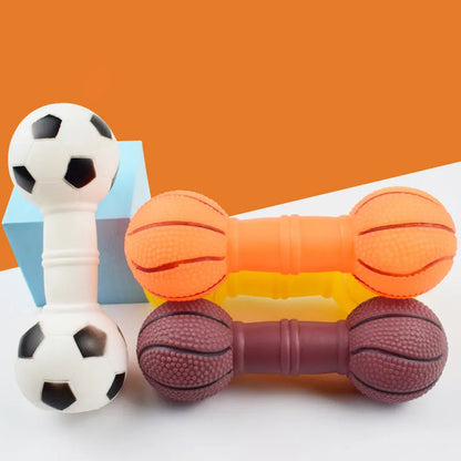 Brown, orange, white, and yellow PVC football dumbbell squeaky dog chew toy.