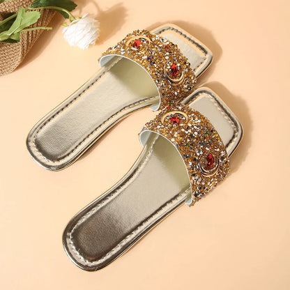 Gold women's flat slippers with rhinestone and sequin decoration on the PU upper.